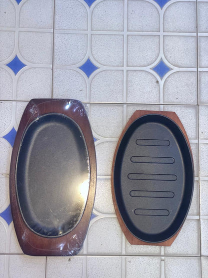 Cast Iron Hot Sizzling Plate on Wooden Tray